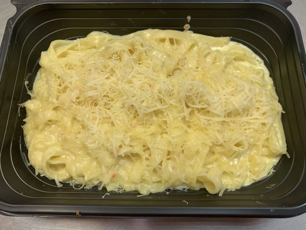 Телятели със сос от топено сирене и пармезан